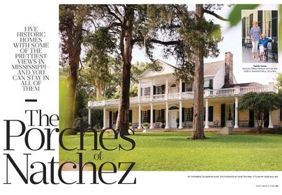 Photo of Linden Antebellum's 2-story white exterior among tall trees from Southern Living article
